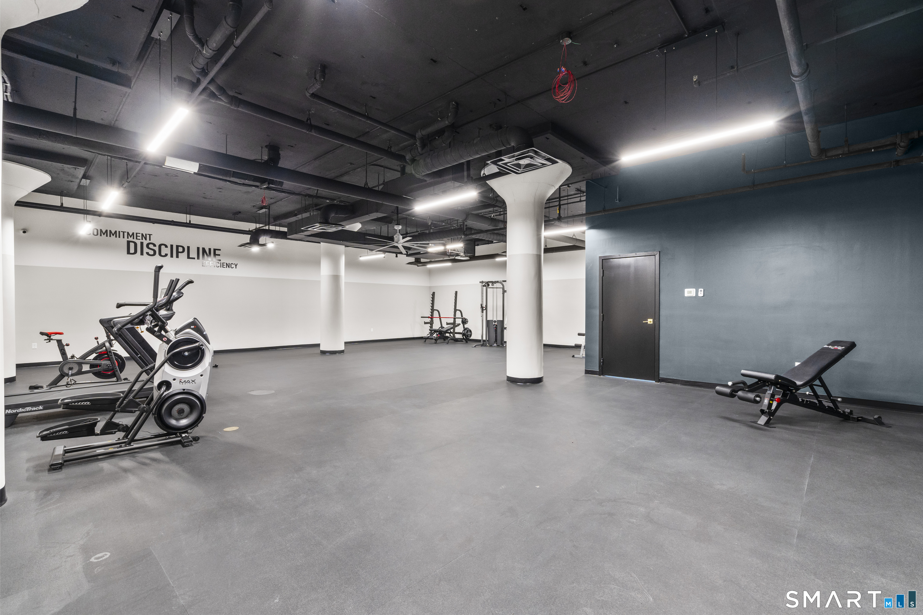 480 Myrtle Street, Unit 402 New Britain, CT 06053 - Photo 11 of 17 a view of a room with gym equipment