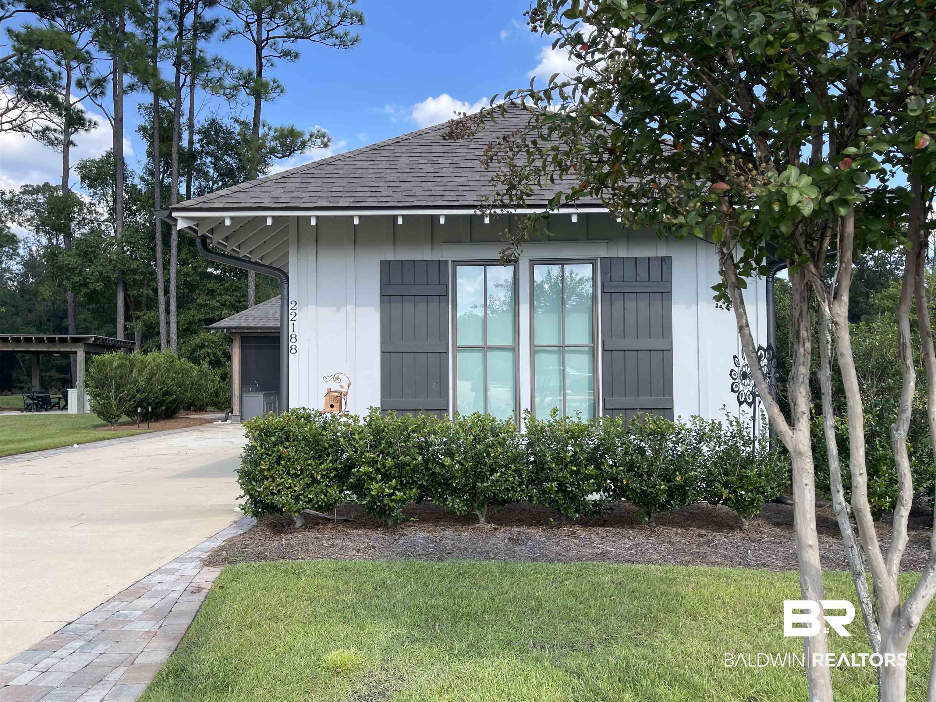 6 Fairhope Motorcoach Loop Fairhope, AL 36532 - Photo 1 of 33 View of property exterior featuring a yard