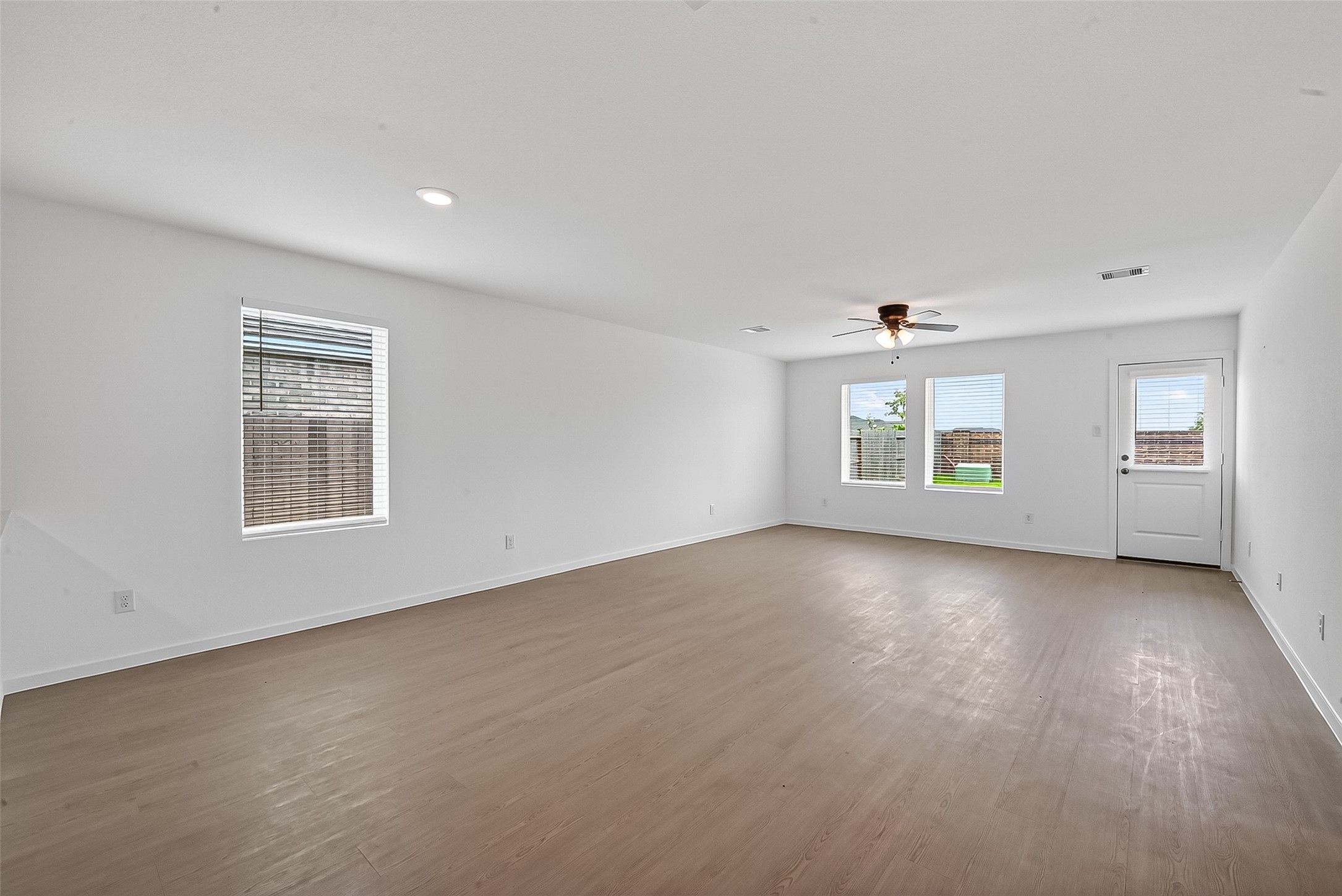 2623 American Ruby Drive Rosharon, TX 77583 - Photo 3 of 14 The home revolves around the spacious open living room with ample natural light!