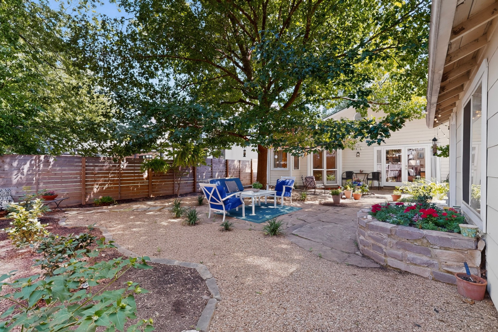 1906 Collier Street Austin, TX 78704 - Photo 35 of 40 An inviting backyard oasis offers ample space for outdoor relaxation and gardening.