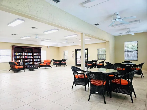 a view of washer and dryer with wooden floor