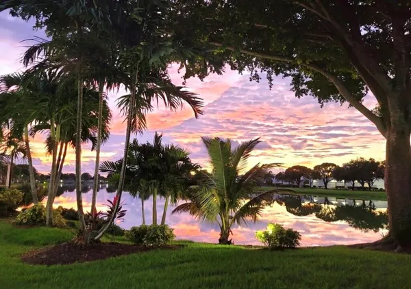 a view of a lake with a garden