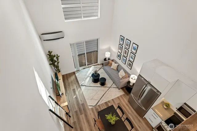 a view of living room with furniture and a window