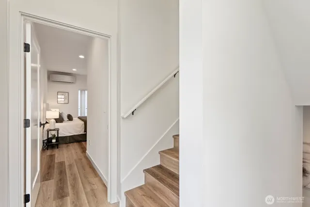 a view of a bedroom from a hallway