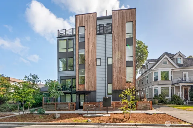 a front view of a building with street view