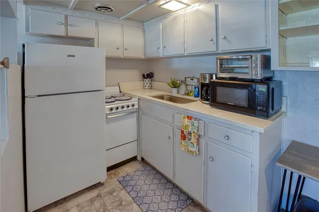 a bedroom with bed and a window