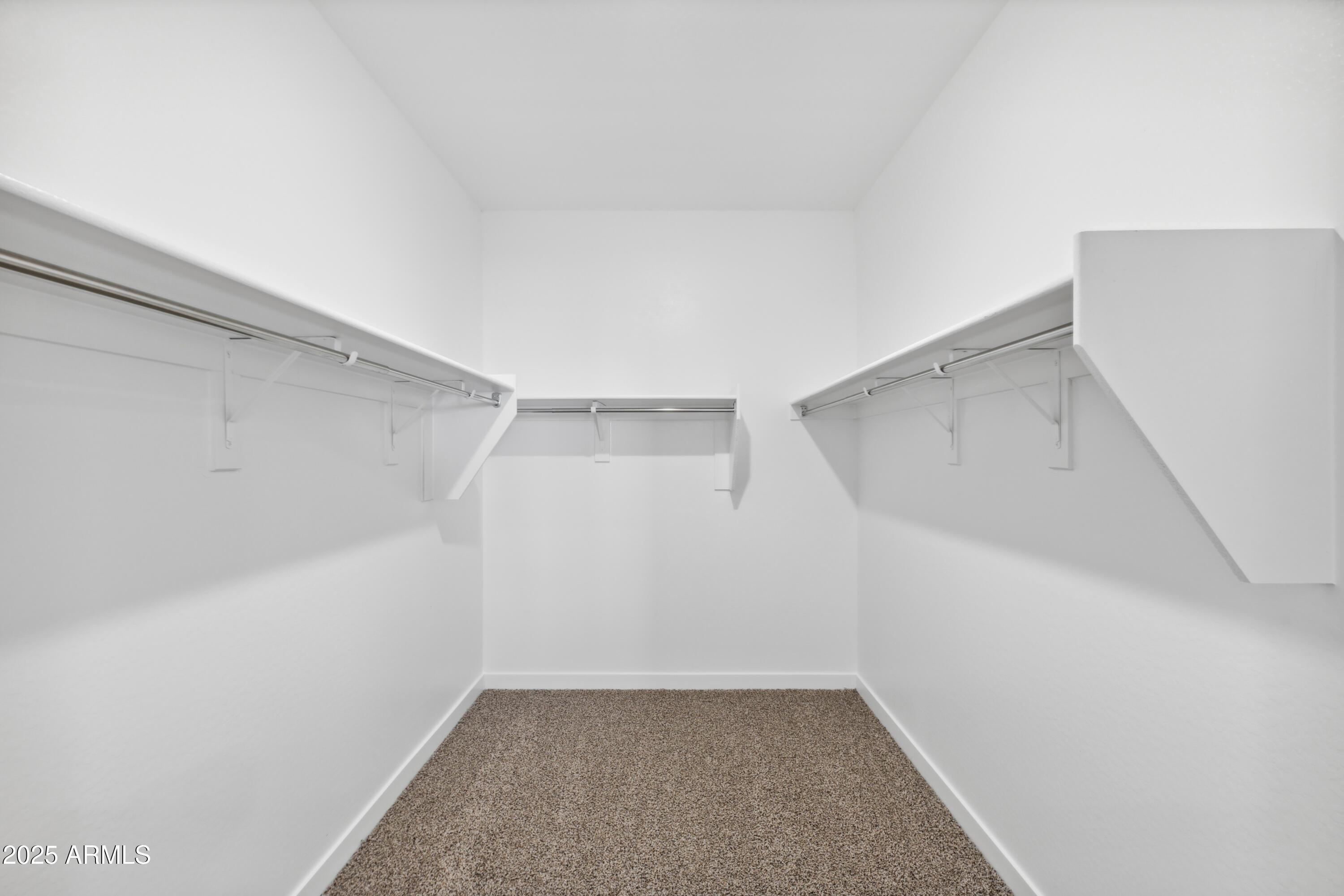 1414 East Bealey Avenue Coolidge, AZ 85128 - Photo 9 of 17 a view of an empty walk in closet