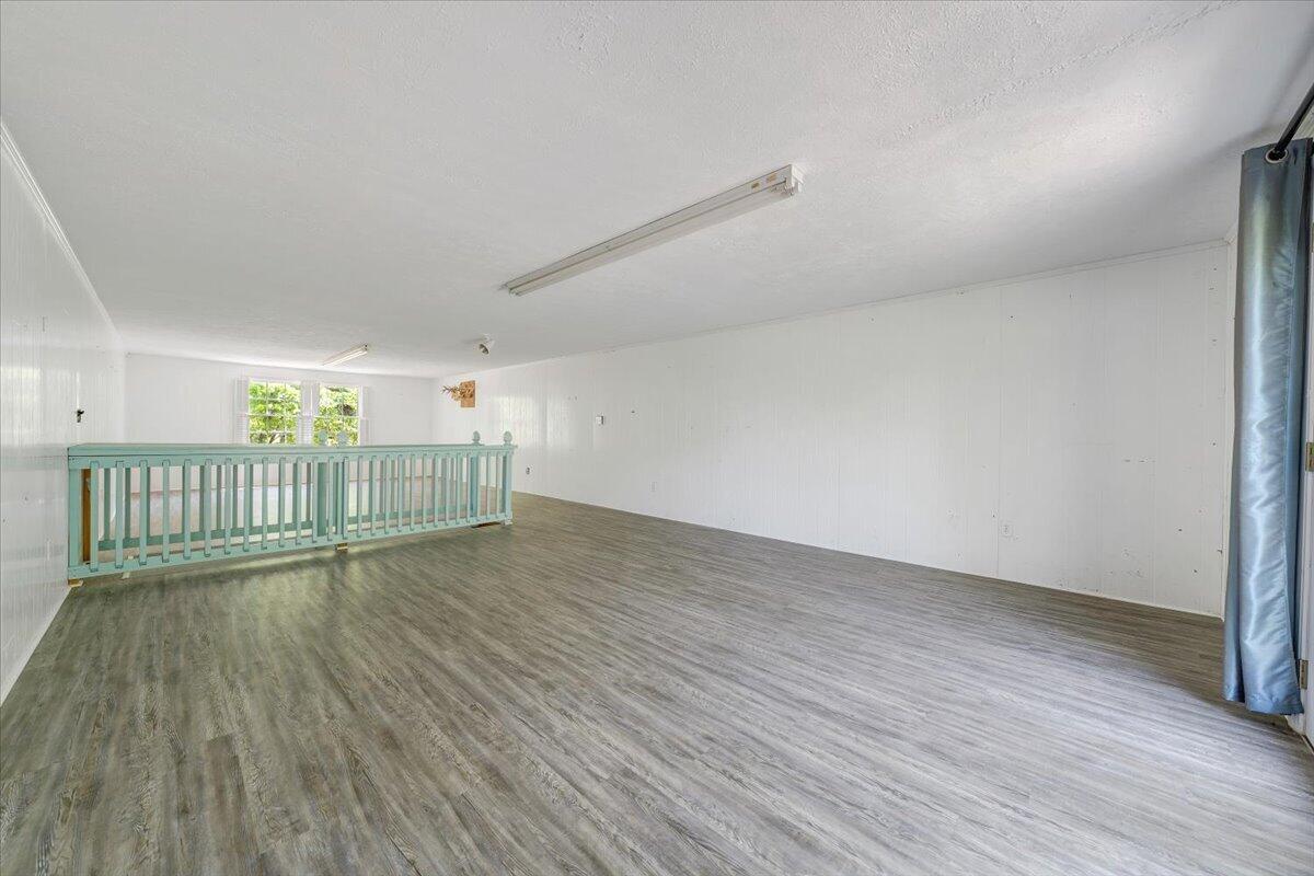 2011 Spencer-Preston Road Martinsville, VA 24112 - Photo 112 of 130 a view of an empty room with wooden floor