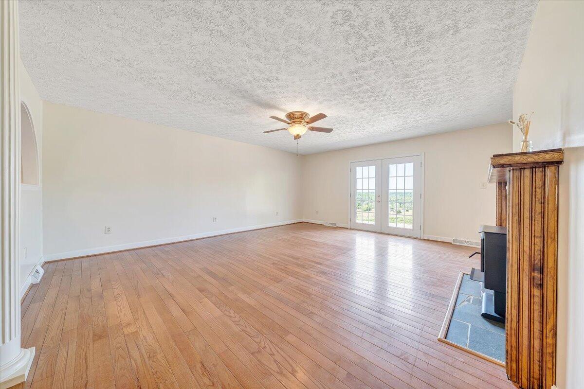 2011 Spencer-Preston Road Martinsville, VA 24112 - Photo 12 of 130 a view of a livingroom with wooden floor and window