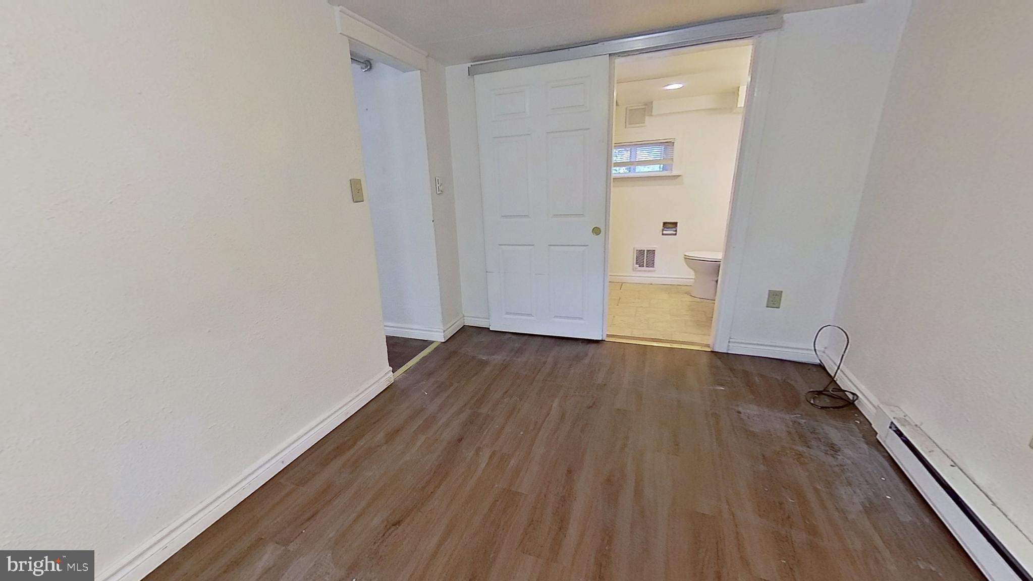 28 East Maple Street Dallastown, PA 17313 - Photo 5 of 6 a view of a room with wooden floor and a sink