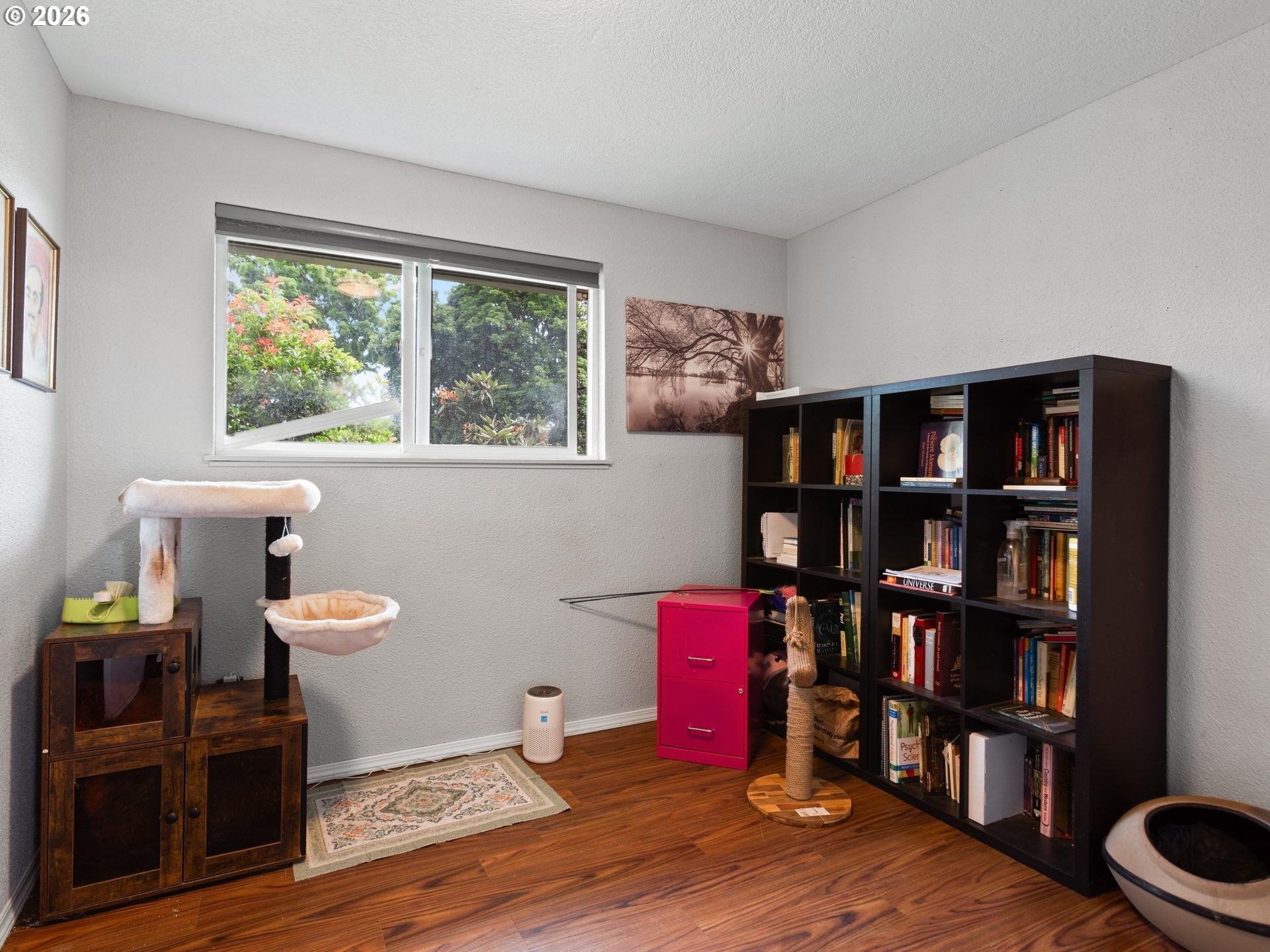 1719 Southwest 1st Street Battle Ground, WA 98604 - Photo 24 of 37 a room with furniture book shelf and book shelf