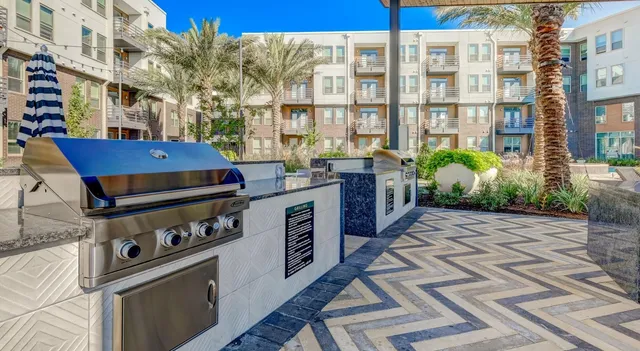a view of a brick building with many windows