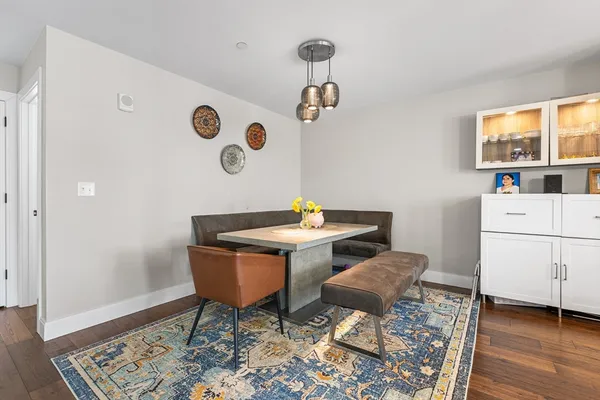a workspace with furniture and wooden floor