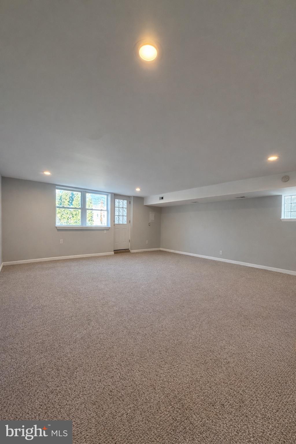 419 Rennard Street Philadelphia, PA 19116 - Photo 14 of 15 a view of empty room with windows