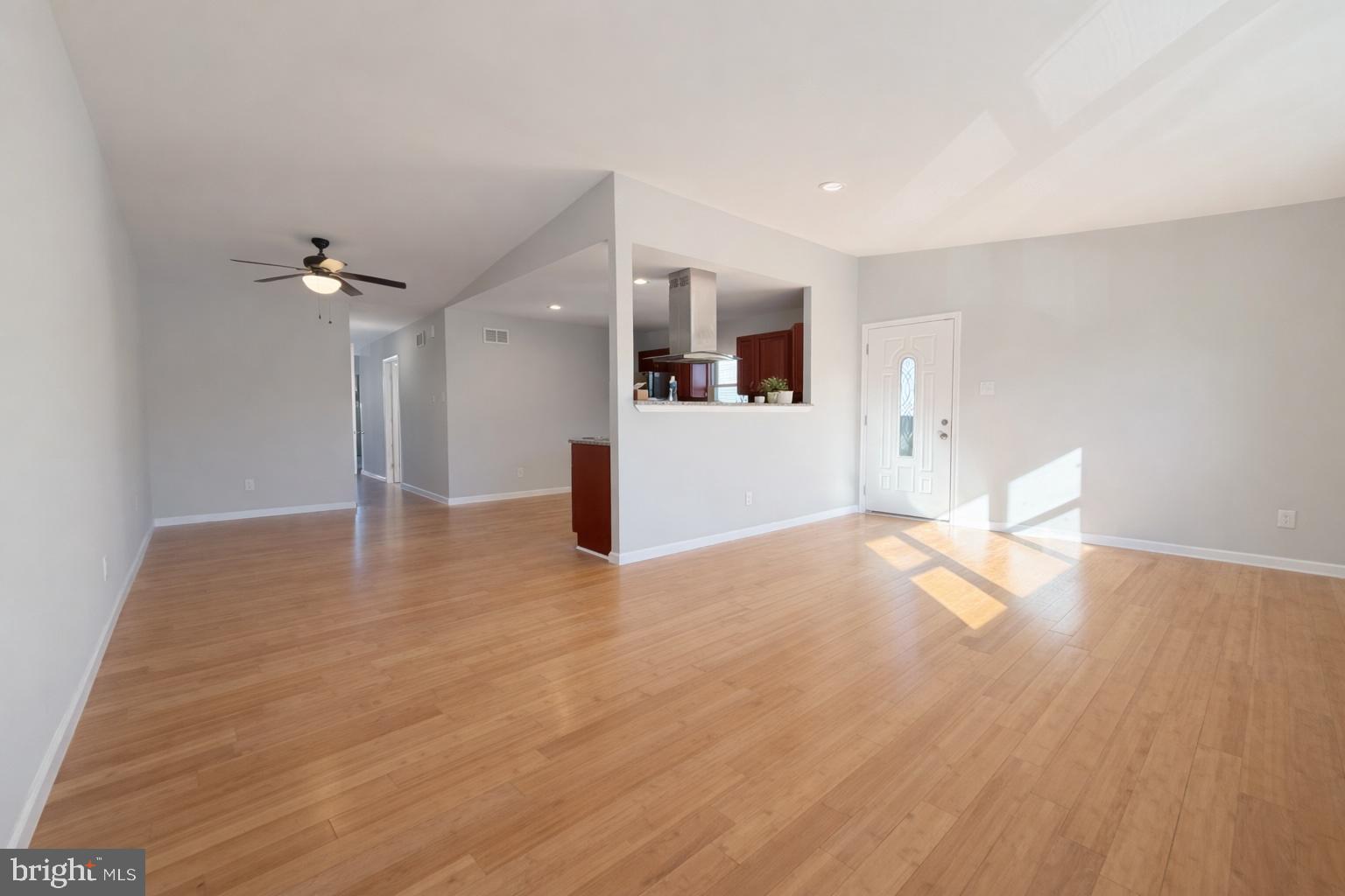 419 Rennard Street Philadelphia, PA 19116 - Photo 2 of 15 a view of empty room with wooden floor and fan