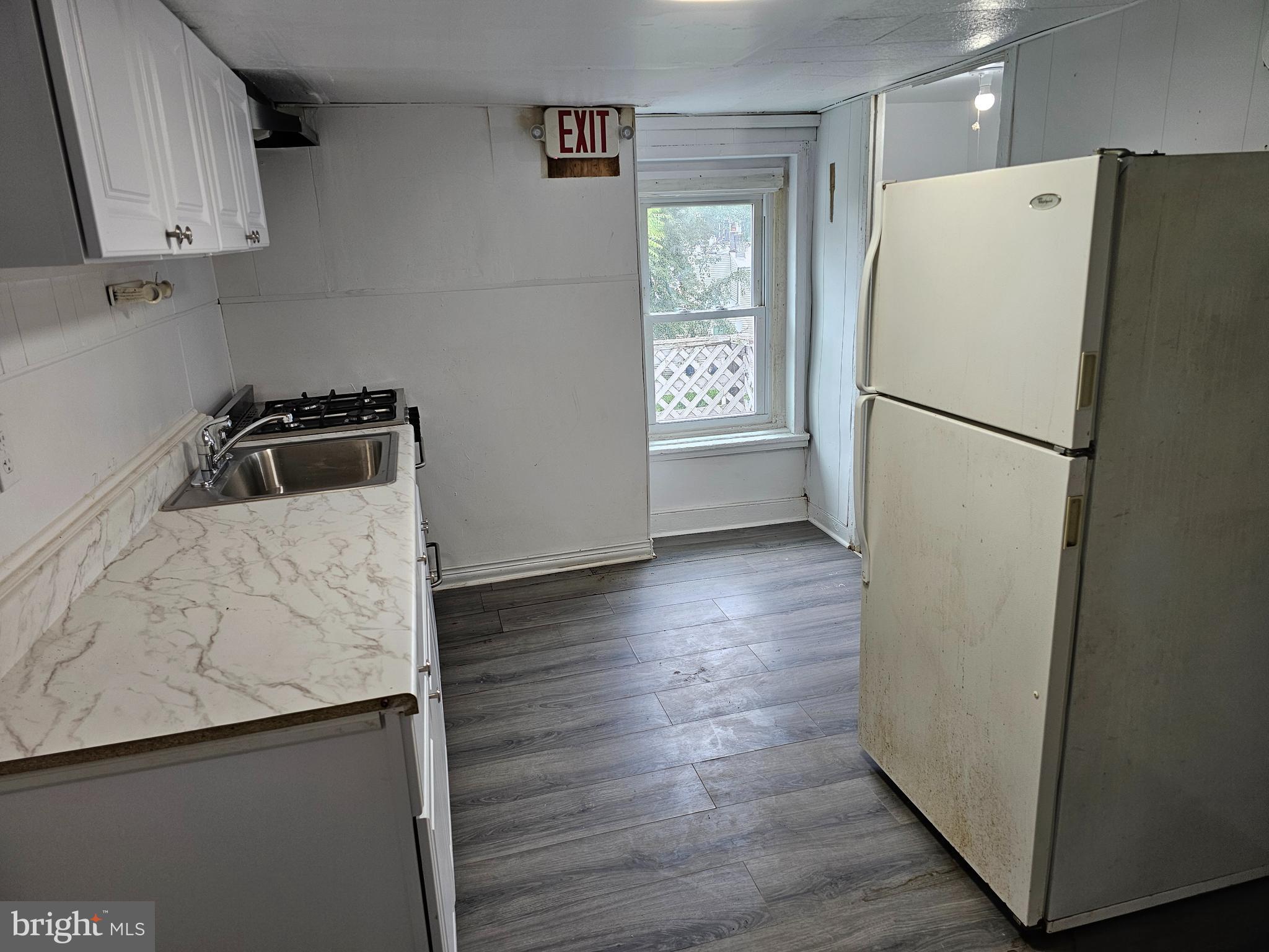 519 York Street, Unit 3 Burlington, NJ 08016 - Photo 2 of 6 a white refrigerator freezer sitting inside of a kitchen