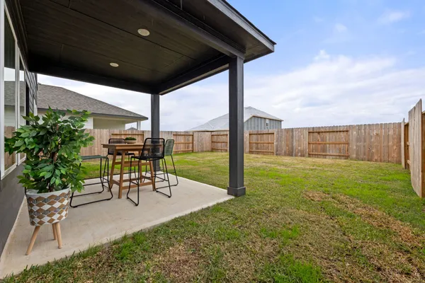 a garden view with a seating space