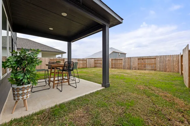 a garden view with a seating space
