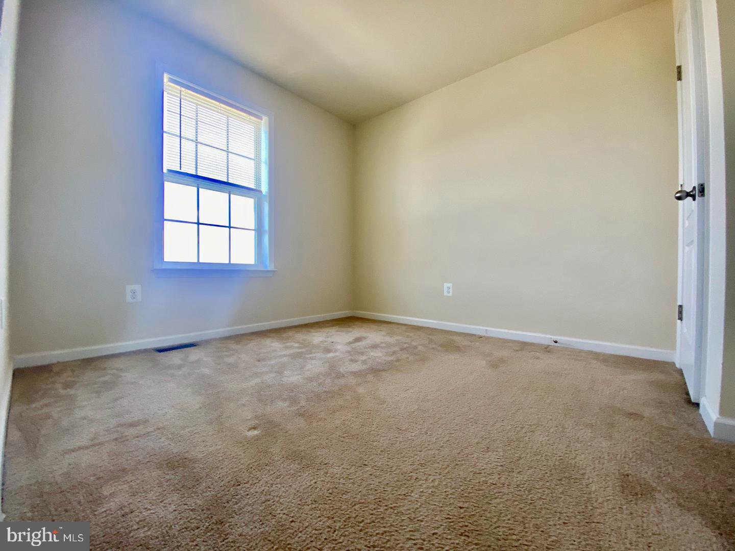 1100 Frontline Drive Frederick, MD 21703 - Photo 12 of 19 an empty room with a window