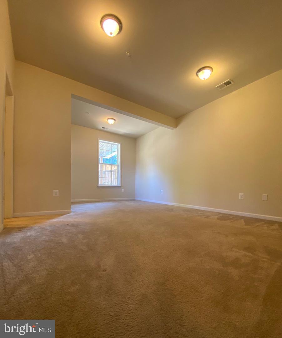 1100 Frontline Drive Frederick, MD 21703 - Photo 15 of 19 an empty room with a empty space and a window
