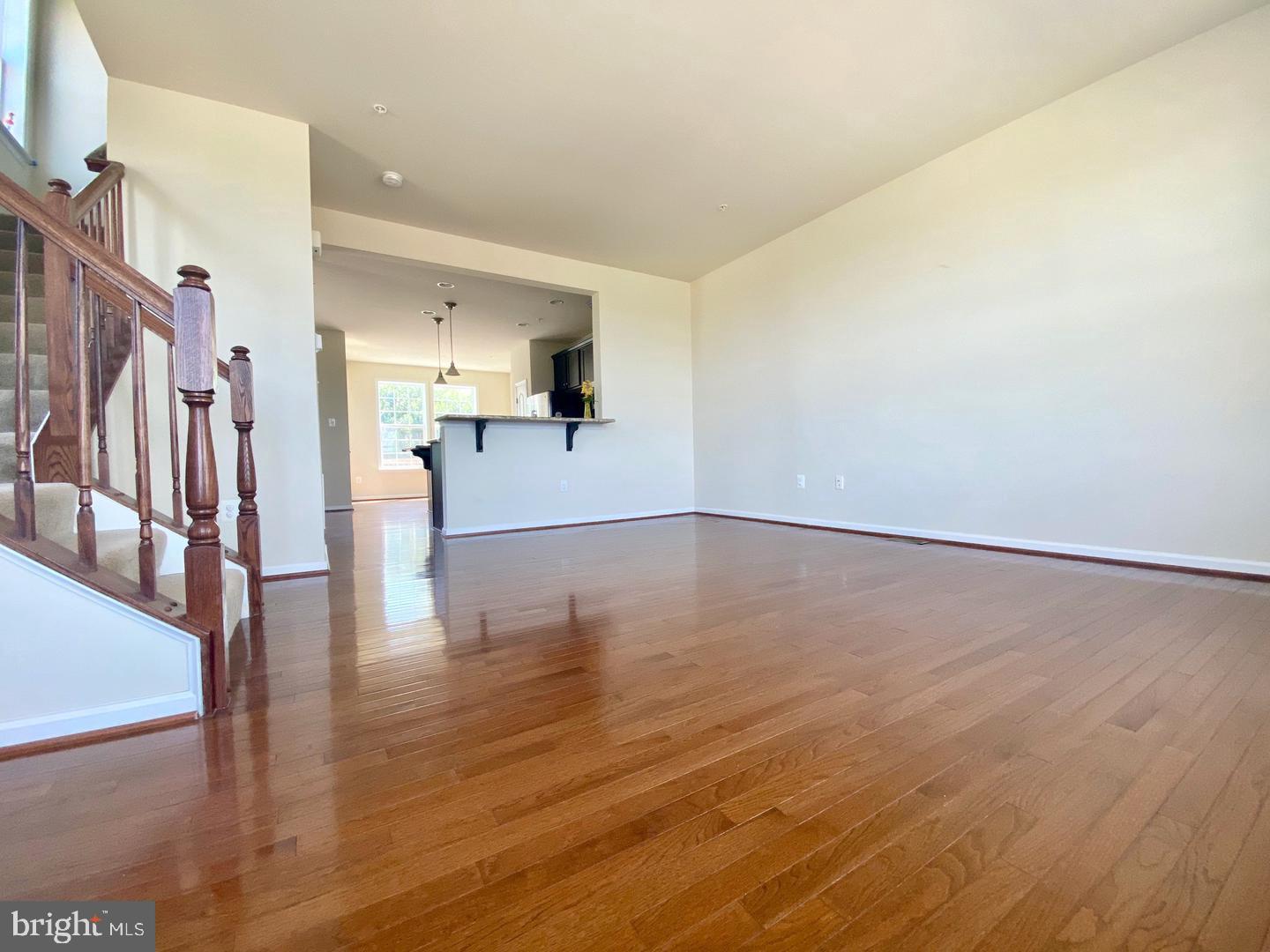 1100 Frontline Drive Frederick, MD 21703 - Photo 3 of 19 a view of empty room with wooden floor