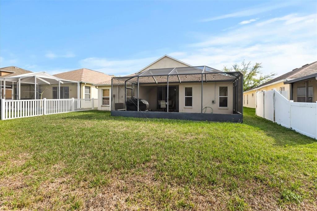 11478 Weston Course Loop Riverview, FL 33579 - Photo 15 of 22 a view of a house with a yard and sitting area