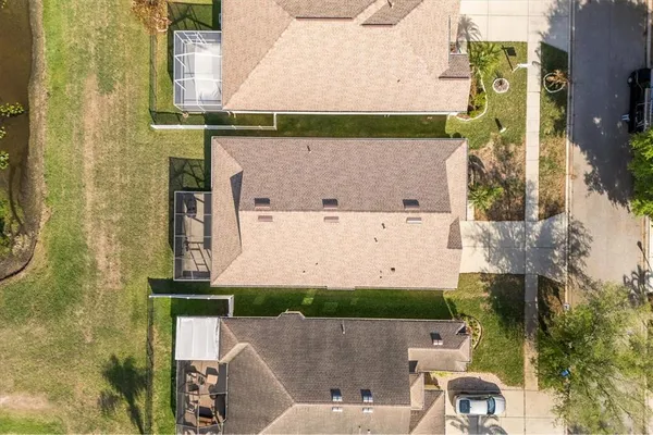 aerial view of a house with a swimming pool