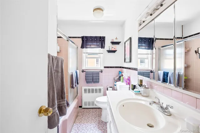 a kitchen with stainless steel appliances a refrigerator stove and sink