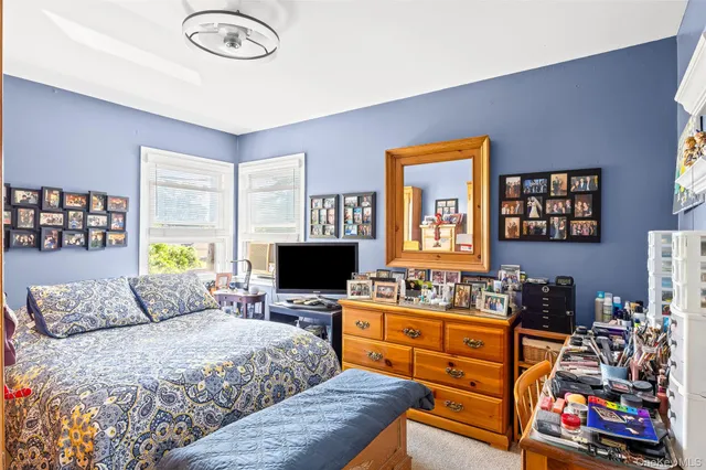 a kitchen with stainless steel appliances a stove and cabinets