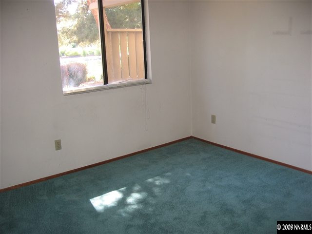 4448 Matich Drive Reno, NV 89502 - Photo 4 of 6 an empty room with a window