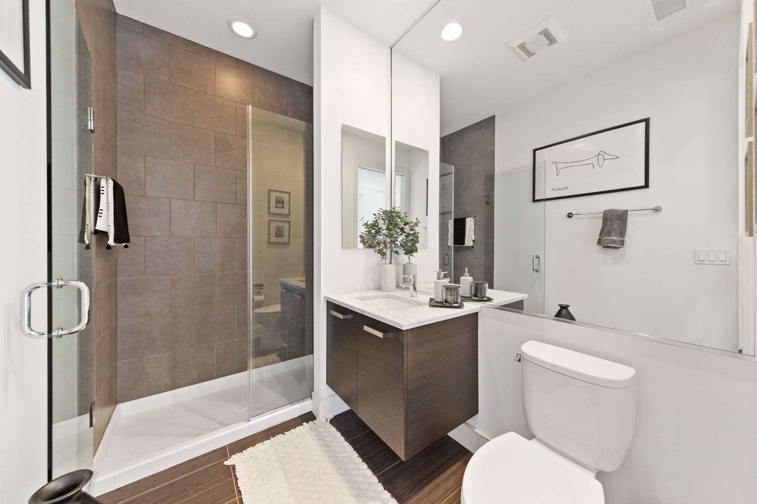 122 South Aberdeen Street, Unit 5N Chicago, IL 60607 - Photo 17 of 23 a bathroom with a sink toilet and shower