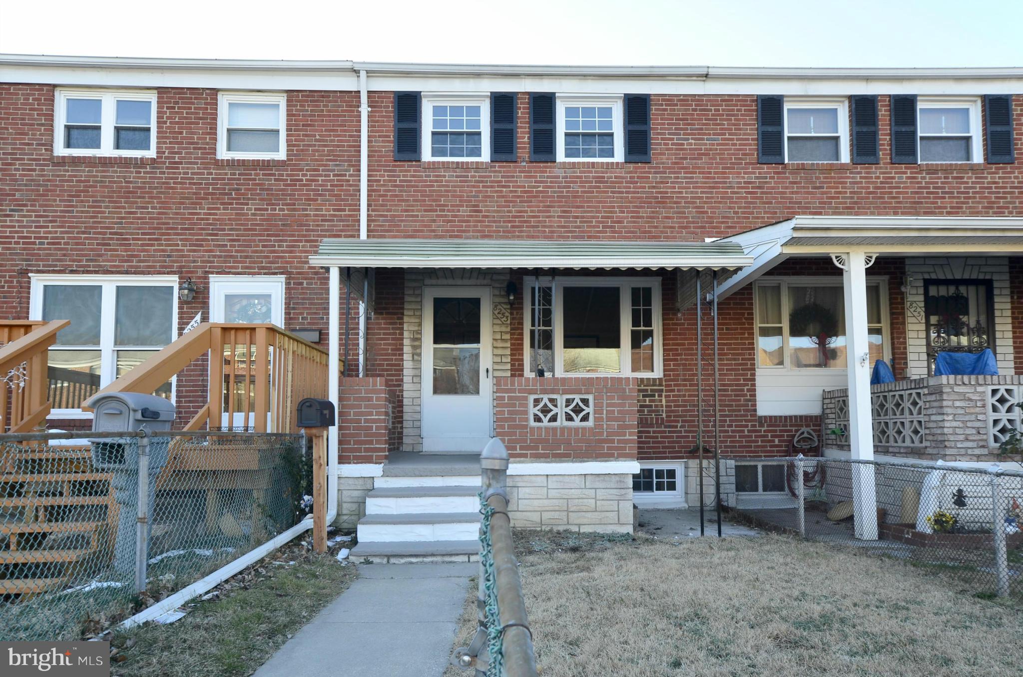 8253 Kavanagh Road Baltimore, MD 21222 - Photo 27 of 29 a front view of a house with a yard