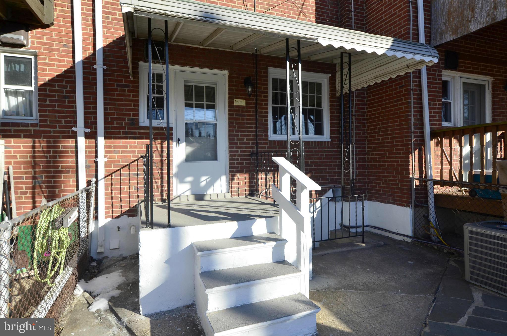 8253 Kavanagh Road Baltimore, MD 21222 - Photo 28 of 29 a view of the house with a large window