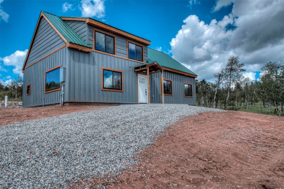 1835 Sheep Ridge Road Fairplay, CO 80440 - Photo 1 of 34 a front view of house with a yard