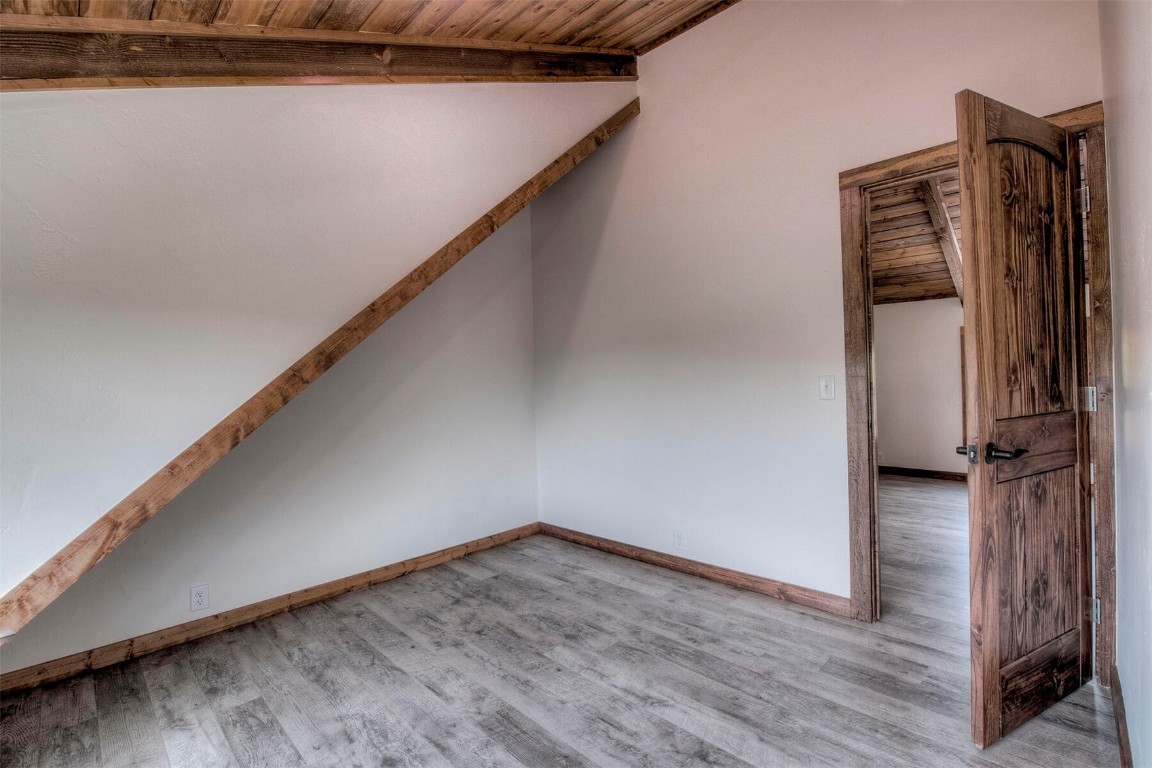 1835 Sheep Ridge Road Fairplay, CO 80440 - Photo 20 of 34 a view of a hallway with wooden floor