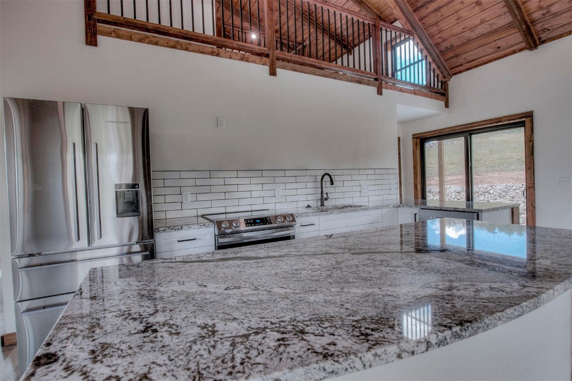 1835 Sheep Ridge Road Fairplay, CO 80440 - Photo 9 of 34 a view of a hall with wooden floor