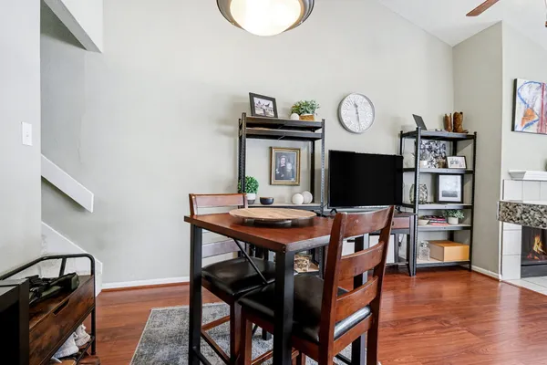 a view of a livingroom with furniture and a flat screen tv