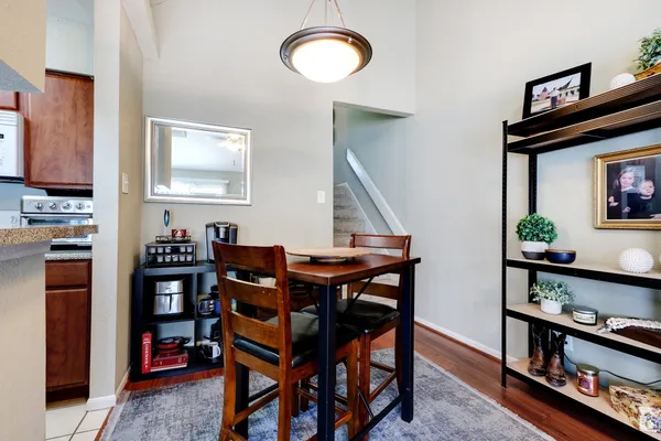 a view of a workspace with furniture