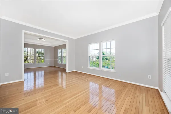 a view of a hallway with windows