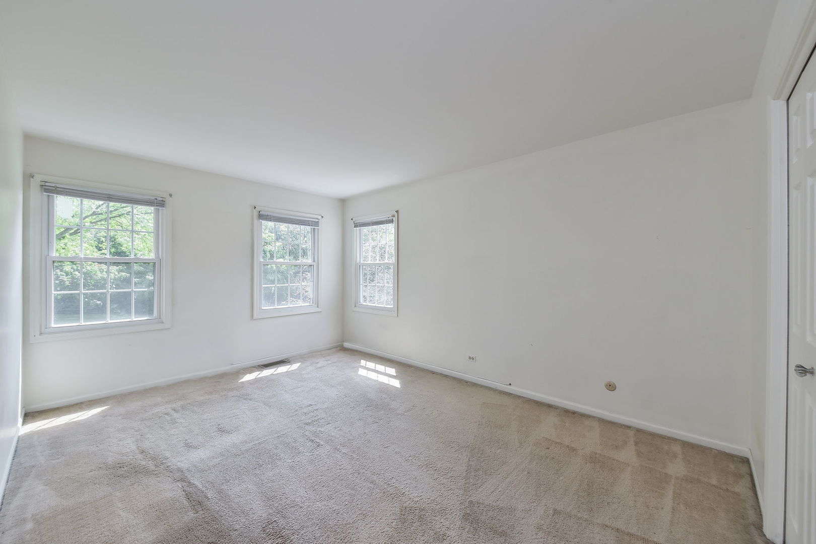 1191 East Gartner Road Naperville, IL 60540 - Photo 13 of 24 a view of an empty room with a window