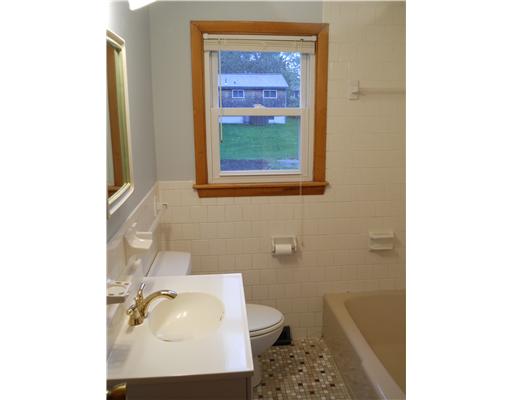 30 Beach Plum Road Narragansett, RI 02882 - Photo 13 of 20 Bathroom. The ground floor bathrooom features a tile floor and a low profile tub with shower.