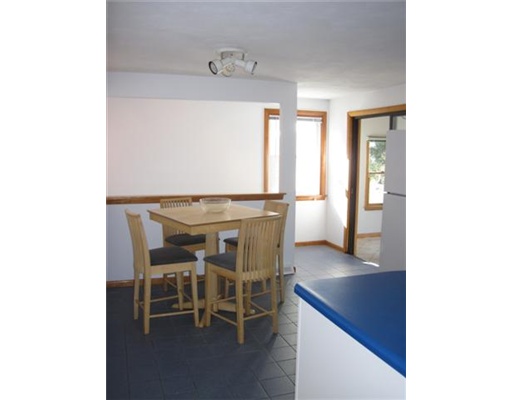 30 Beach Plum Road Narragansett, RI 02882 - Photo 6 of 20 Dining Area. The kitchen includes room for a dinner table.