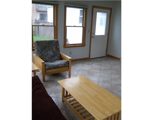 30 Beach Plum Road Narragansett, RI 02882 - Photo 9 of 20 Den/Family/Great Room. The great room flows from the kitchen. It has two entrances which provide easy accss to the outdoor shower and patio.