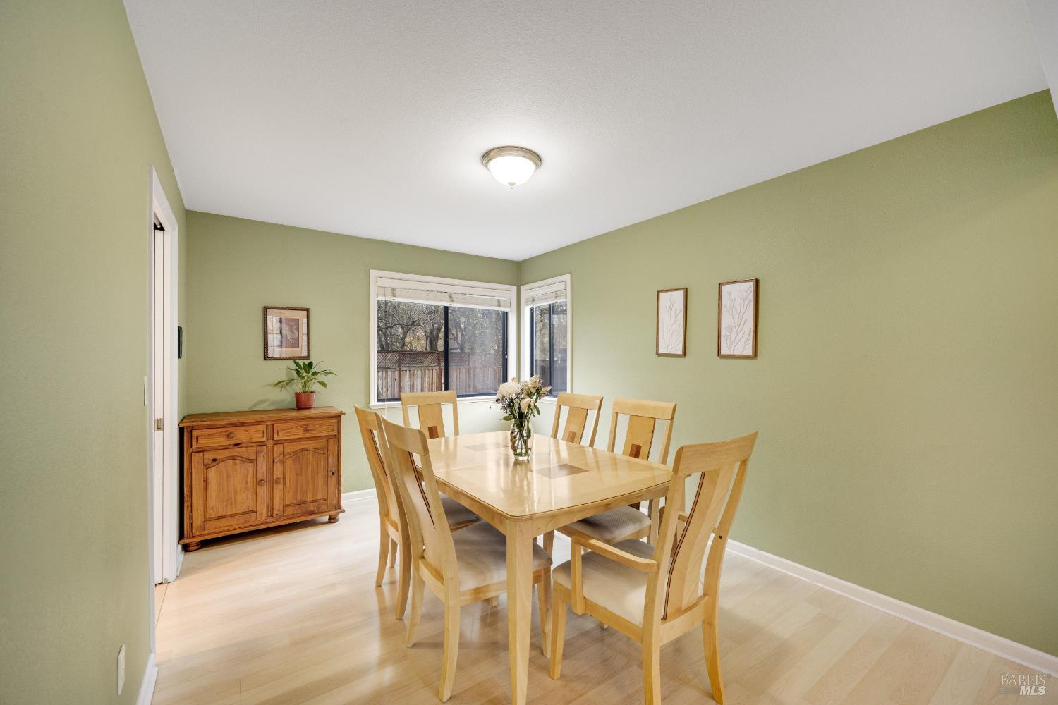 504 Jenifer Court Santa Rosa, CA 95404 - Photo 16 of 61 a dining room with furniture and window