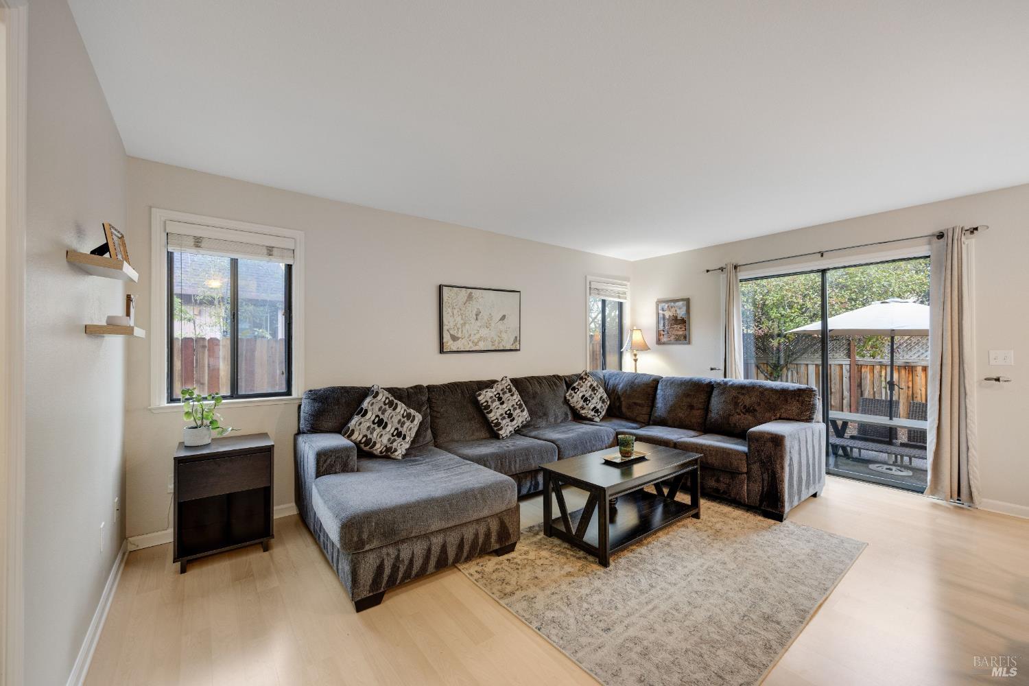 504 Jenifer Court Santa Rosa, CA 95404 - Photo 19 of 61 a living room with furniture and a window