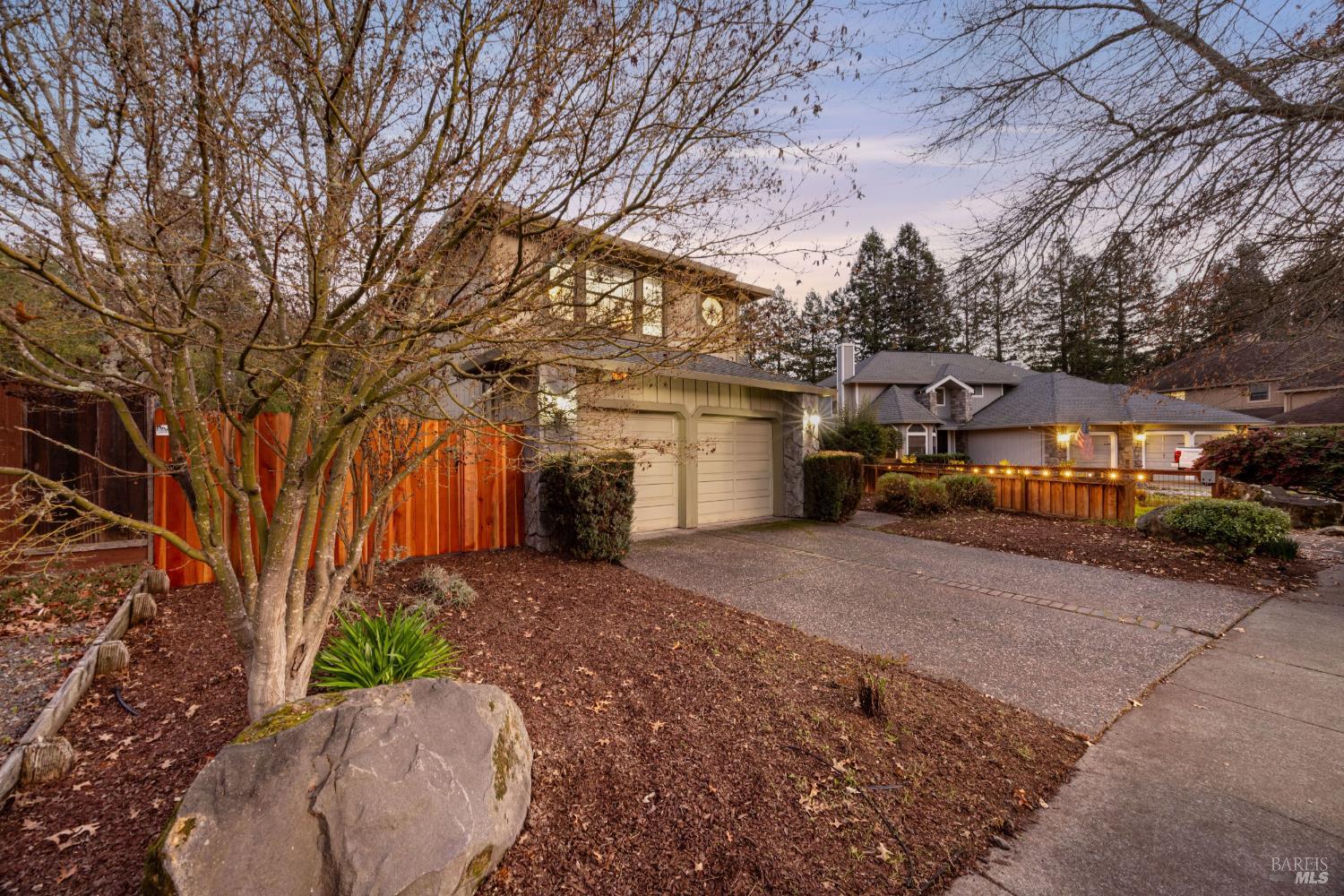 504 Jenifer Court Santa Rosa, CA 95404 - Photo 2 of 61 a front view of a house with a yard and tree s