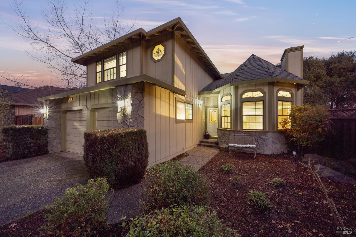 504 Jenifer Court Santa Rosa, CA 95404 - Photo 4 of 61 a front view of a house with garden