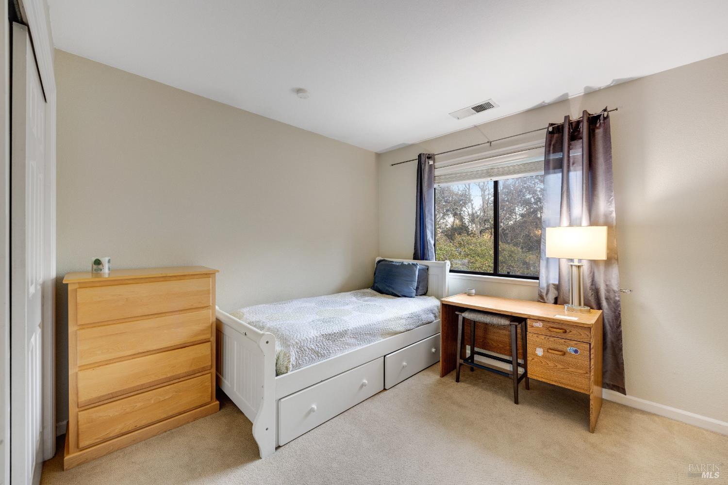 504 Jenifer Court Santa Rosa, CA 95404 - Photo 41 of 61 a room with furniture and window