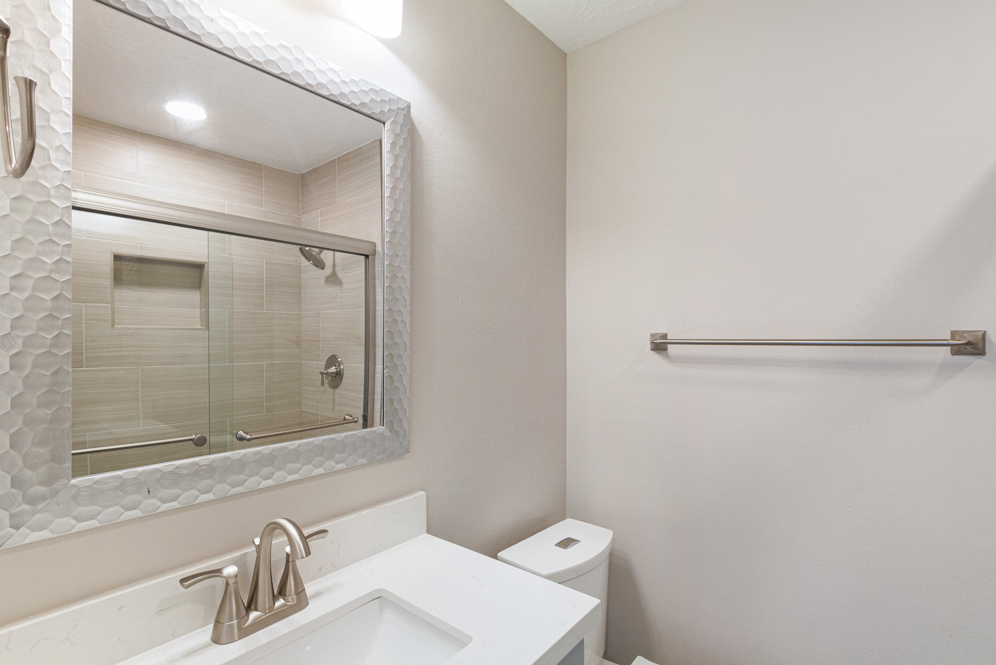 2101 Fountain View Drive, Unit 4 6 Houston, TX 77057 - Photo 11 of 26 a bathroom with a sink and mirror