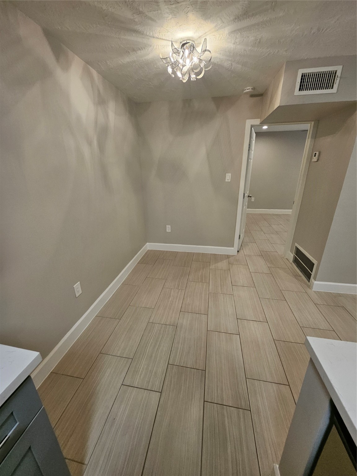 2101 Fountain View Drive, Unit 4 6 Houston, TX 77057 - Photo 23 of 26 a view of an empty room with a window